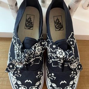 Vans navy and blue flowered and bow shoes. Wore once
